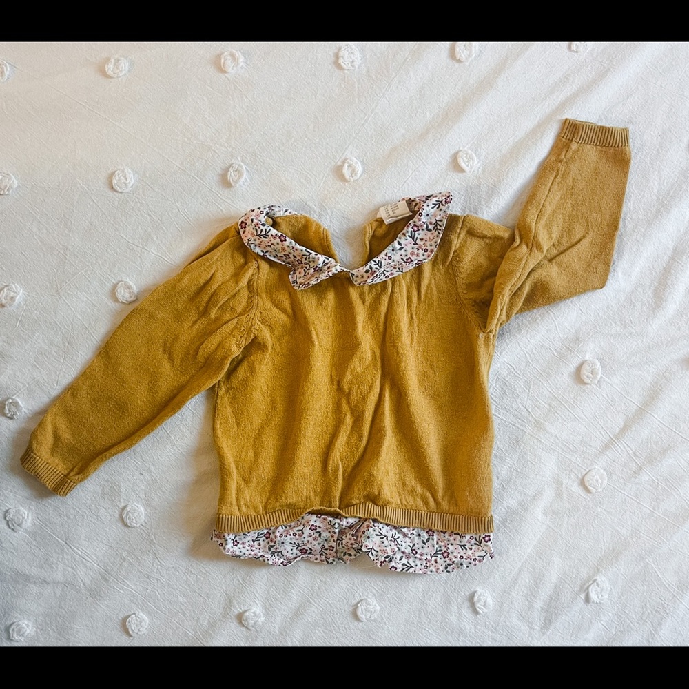 yellow sweater
